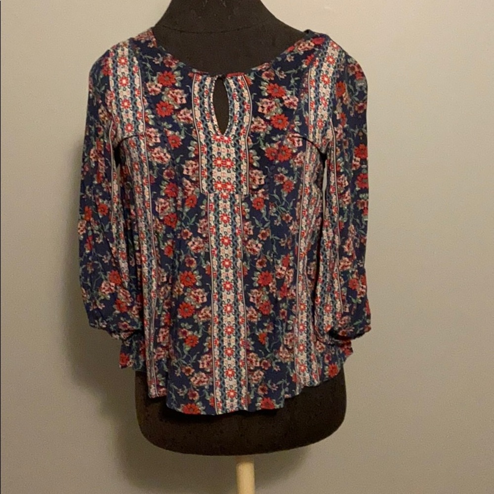 Three quarter length sleeve floral shirt